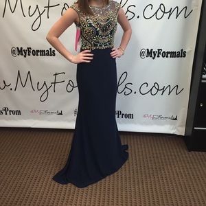 Navy beaded prom dress.
